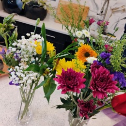 vases of flowers on a table