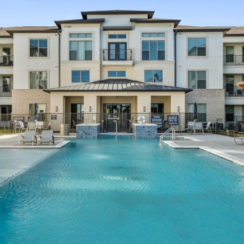 a pool in a large courtyard