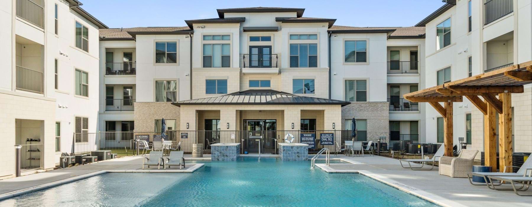 a pool in a large courtyard