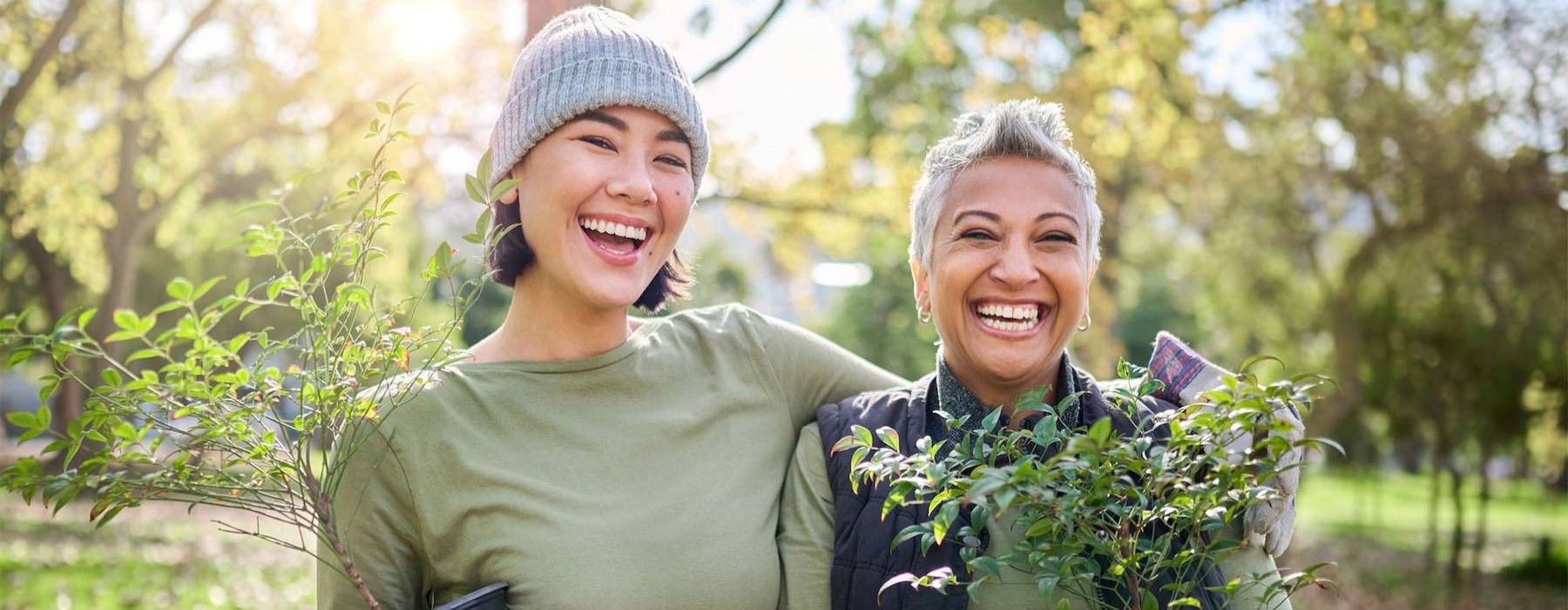 a mother and daughter gardening